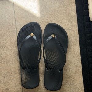 Tory Burch Black Flip Flop Sandals with Gold Logo Accent